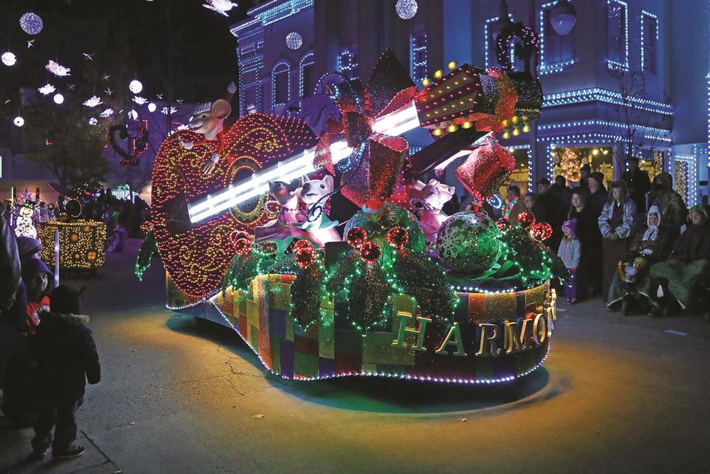 The glittering parade is a highlight of Christmas festivities at Dollywood theme park in the Tennessee Smokies.
