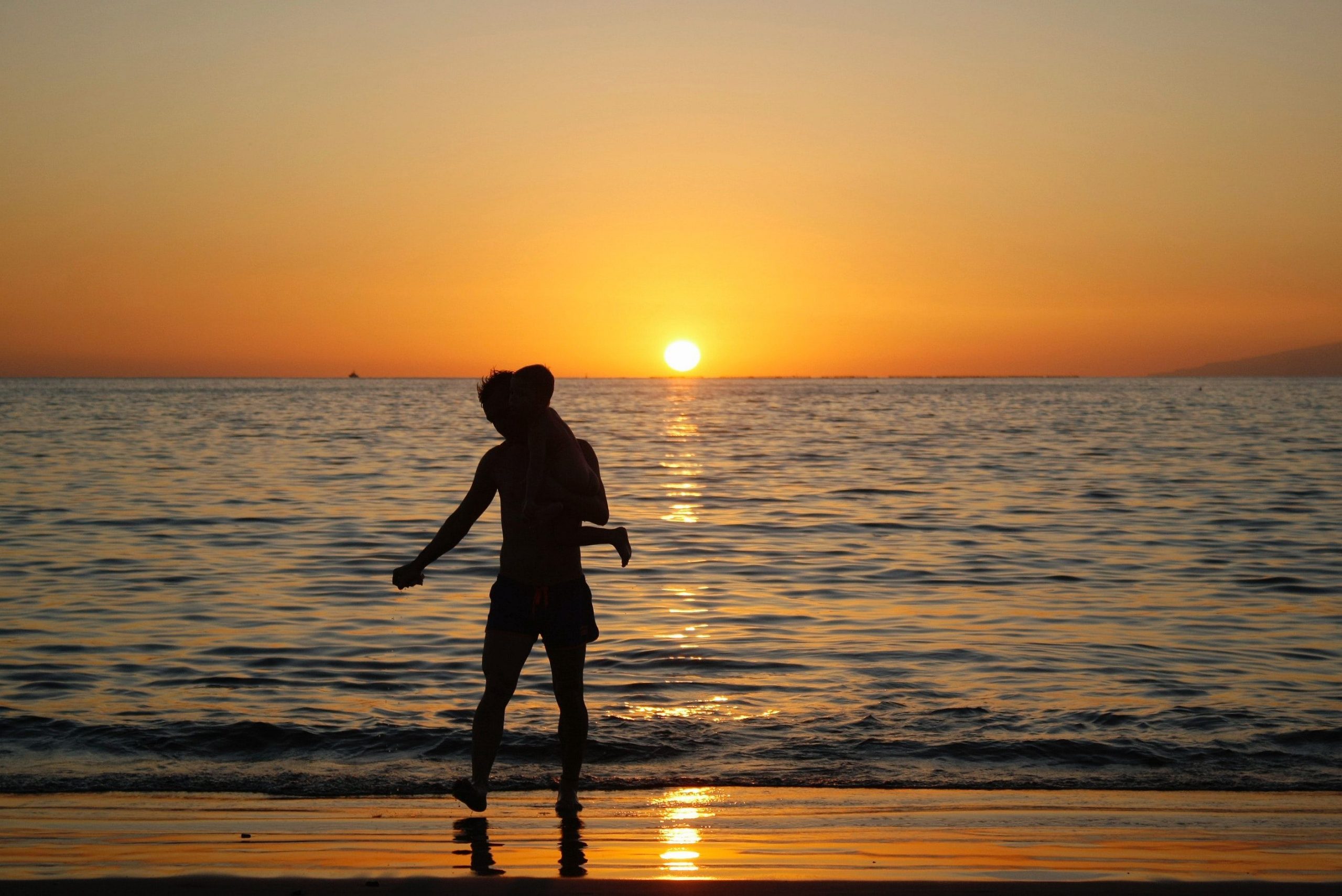 Sunset can be a good time for taking family silhouette shots.