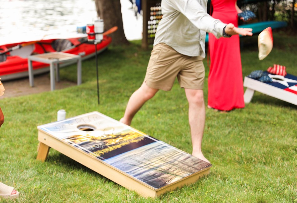 Family Reunion Outdoor Games - playing cornhole. Photo credit Freepik