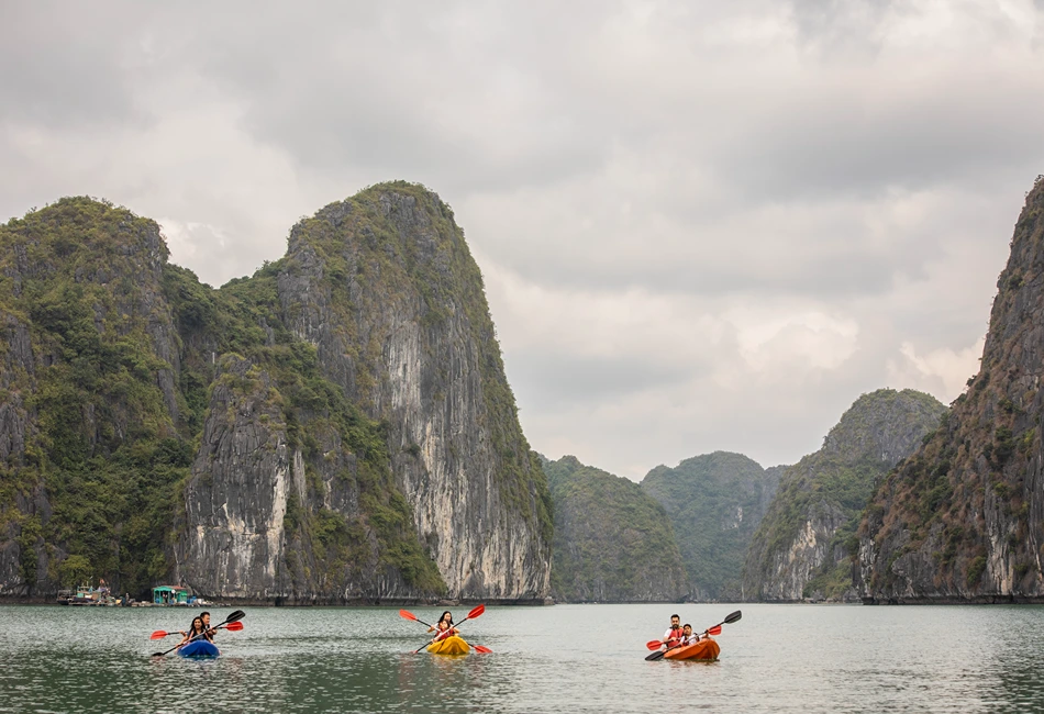 Vietnam Lan Ha Bay provides families with stunning views during kayaking journeys. Credit G Adventures